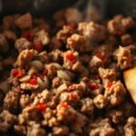 cooking ground beef in skillet for tacos